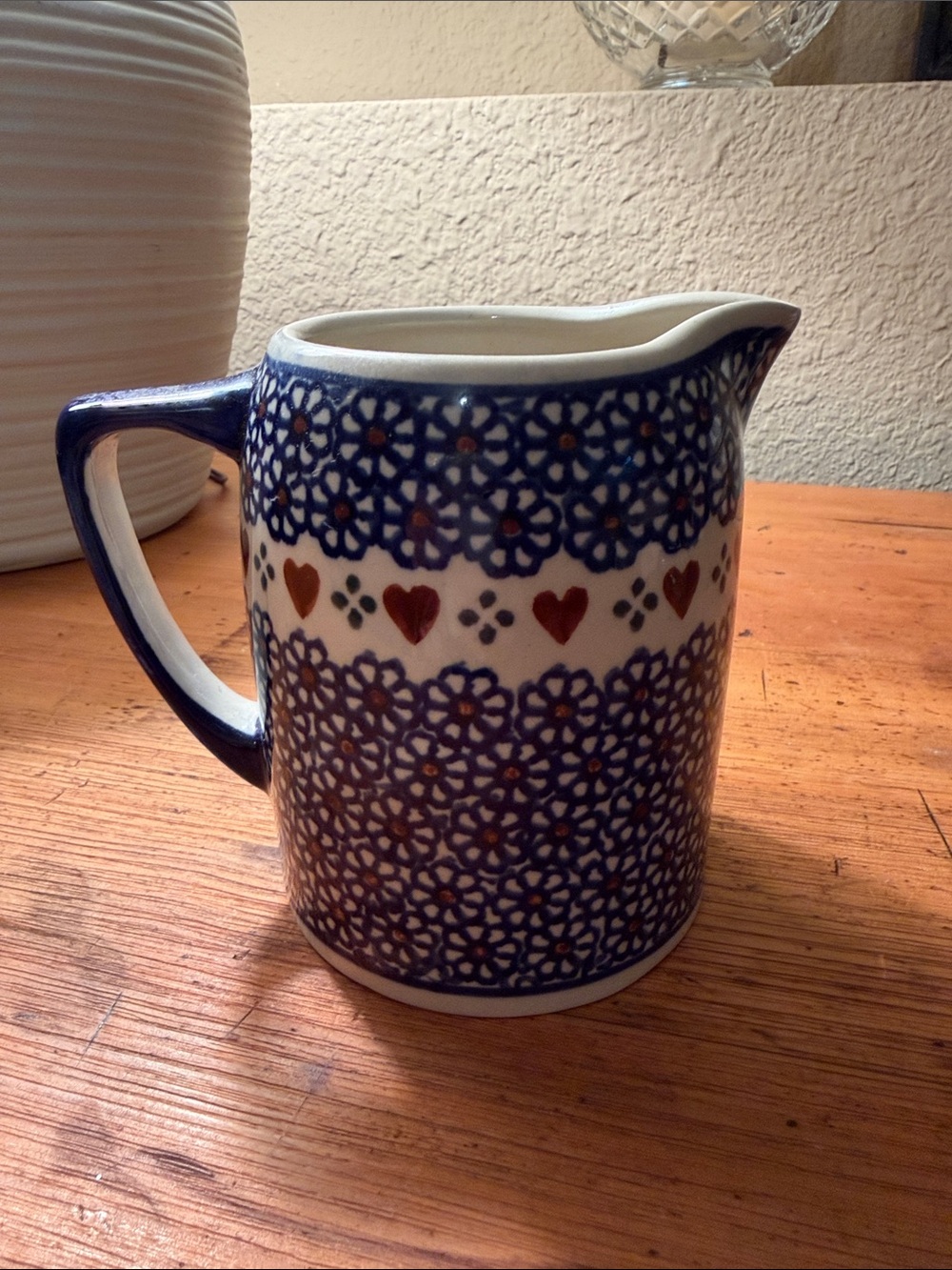 Hand-Painted Blue and Brown Ceramic Pitcher with Heart Motif